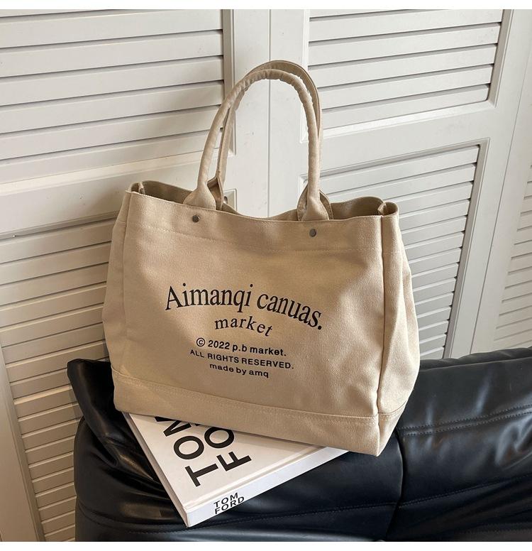 

Large capacity canvas tote bag women s 2024 new autumn leisure shoulder college student class commuter bag хакі