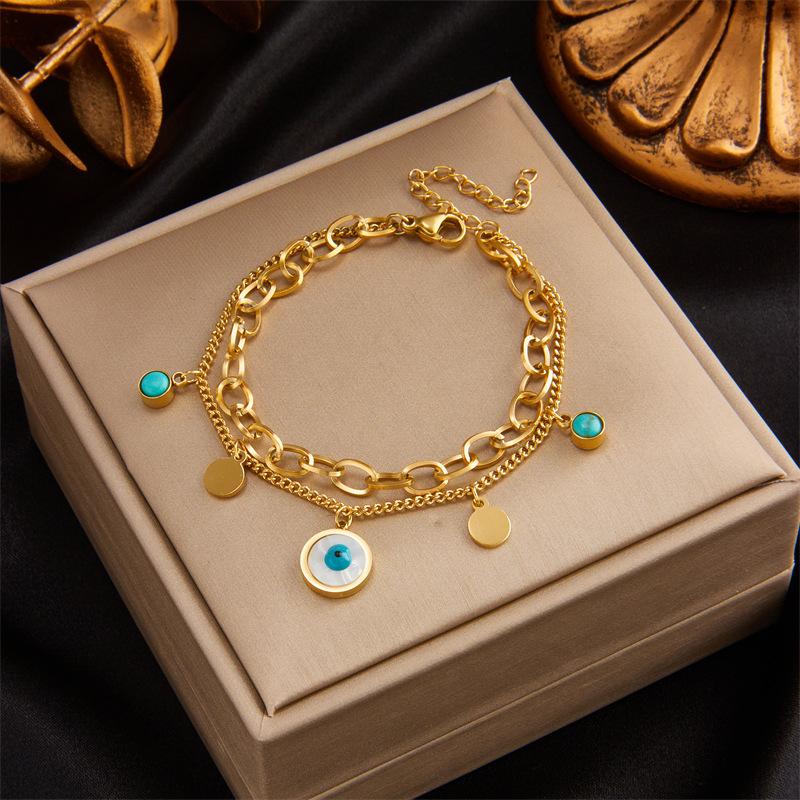 Gold Tone Double Layer Evil Eye Charm Bracelet with Turquoise Accents