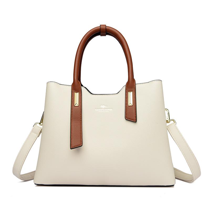 

Эта модная сумка с цветными блоками простая, элегантная и стильная для дам.. Это ручная сумка через плечо бежевый