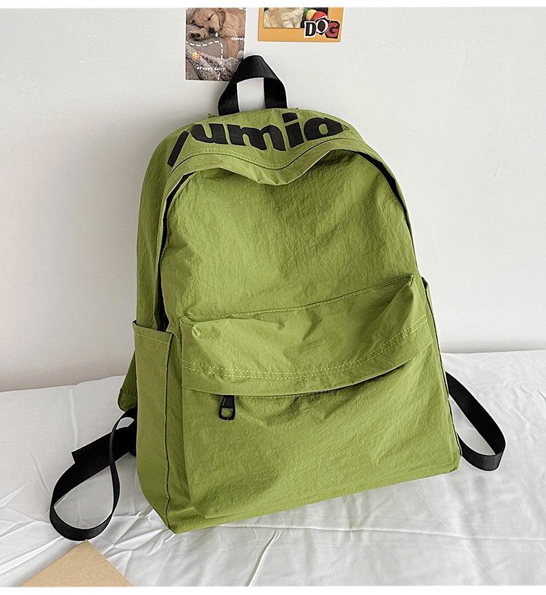 Lightweight Minimalist Backpack for Female Students: Versatile Double-Shoulder Bag for School and Travel.