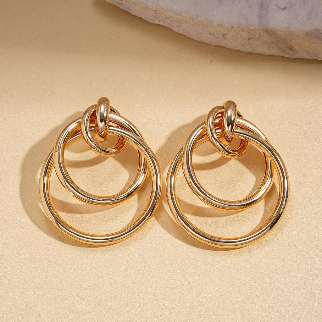 Geometric round winding hollow steel needle earrings environmentally friendly niche earrings