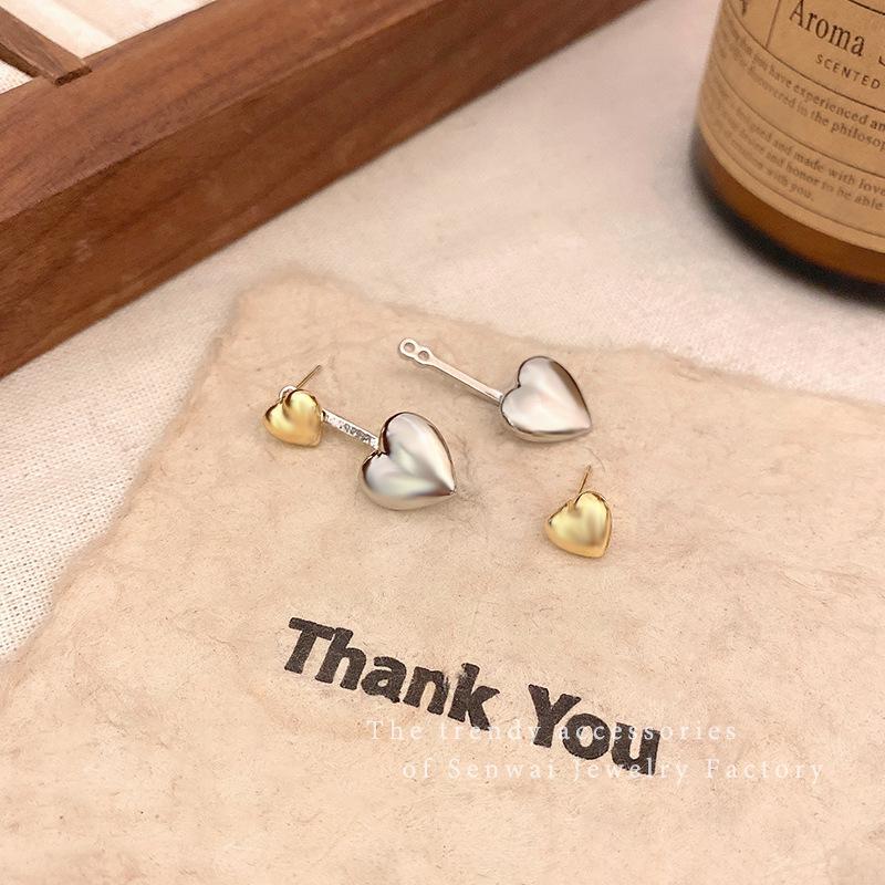 A pair of metal love earrings for women, cold wind niche design commuter earrings, autumn and winter fashion versatile earrings