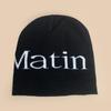 Autumn and winter street letter jacquard knitted hats for men and women to keep warm and wear niche cold hats, pullover hats