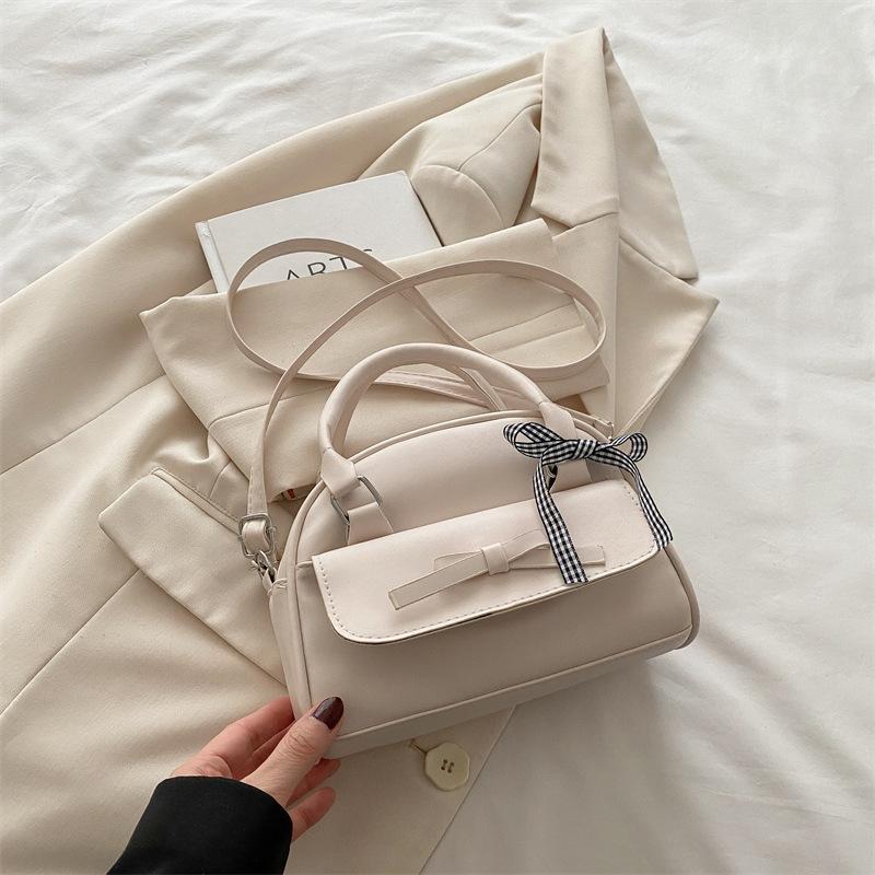 Bow fashion high-value handbag 2025 spring and summer new niche design versatile ins shoulder messenger bag