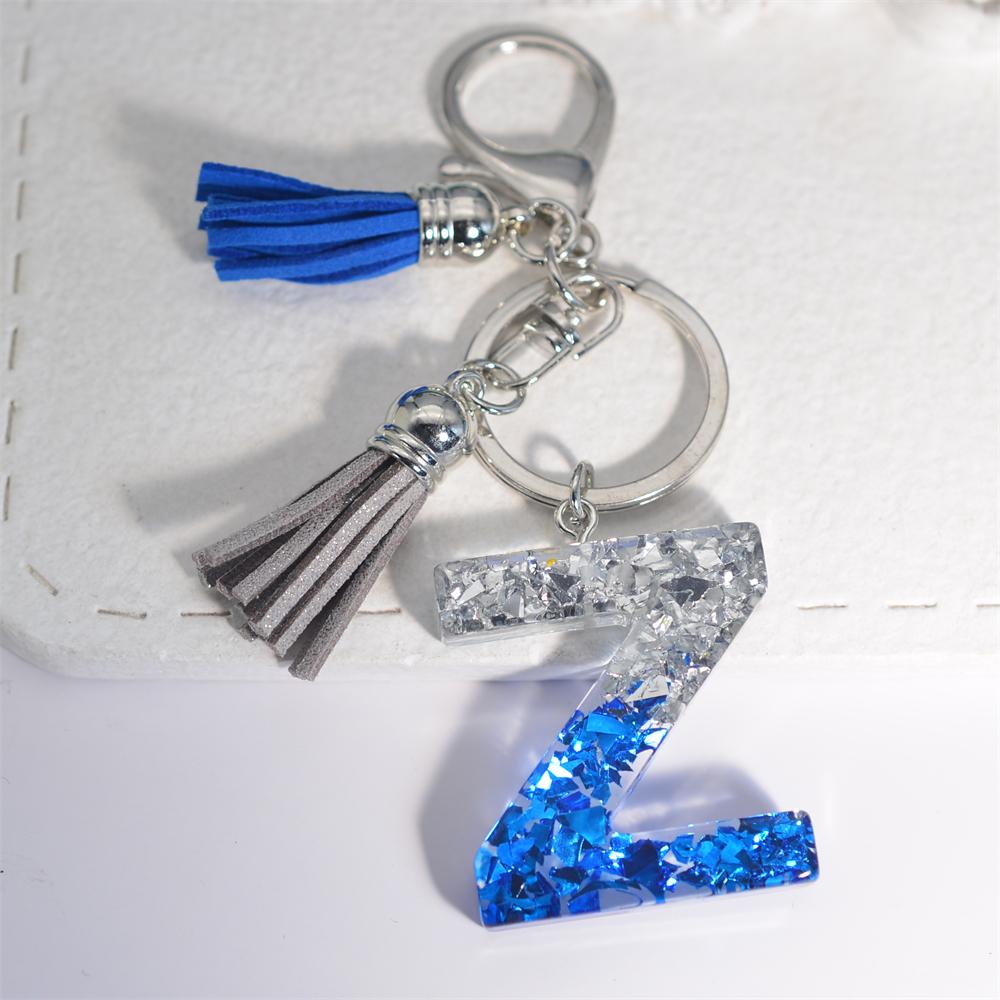 

Креативные брелки из смолы с 26 буквами и кисточками, модные, сине-серебристые, с пайетками, с инициалами, брелки для сумок, подвески, аксессуары