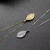 Golden Branch Jade Leaf Necklace for Women: Retro, Light Luxury, Versatile Clavicle Jewelry with Unique Design