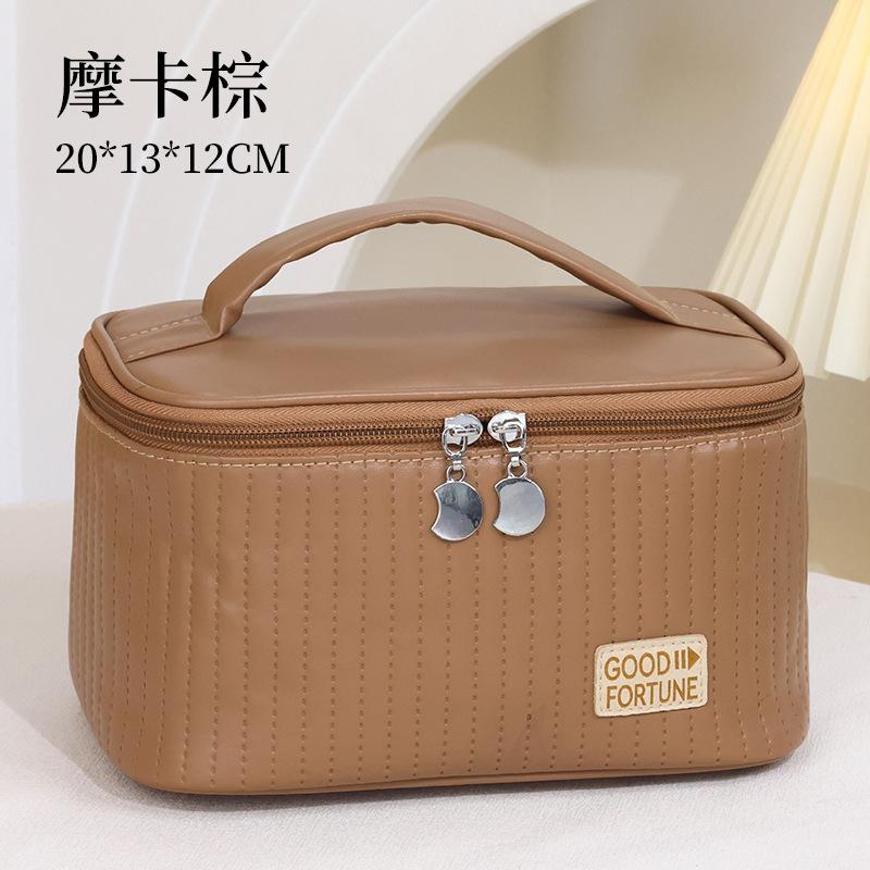 

High value cake cosmetic bag large capacity PU leather storage bag portable cosmetics storage bag travel toilet bag