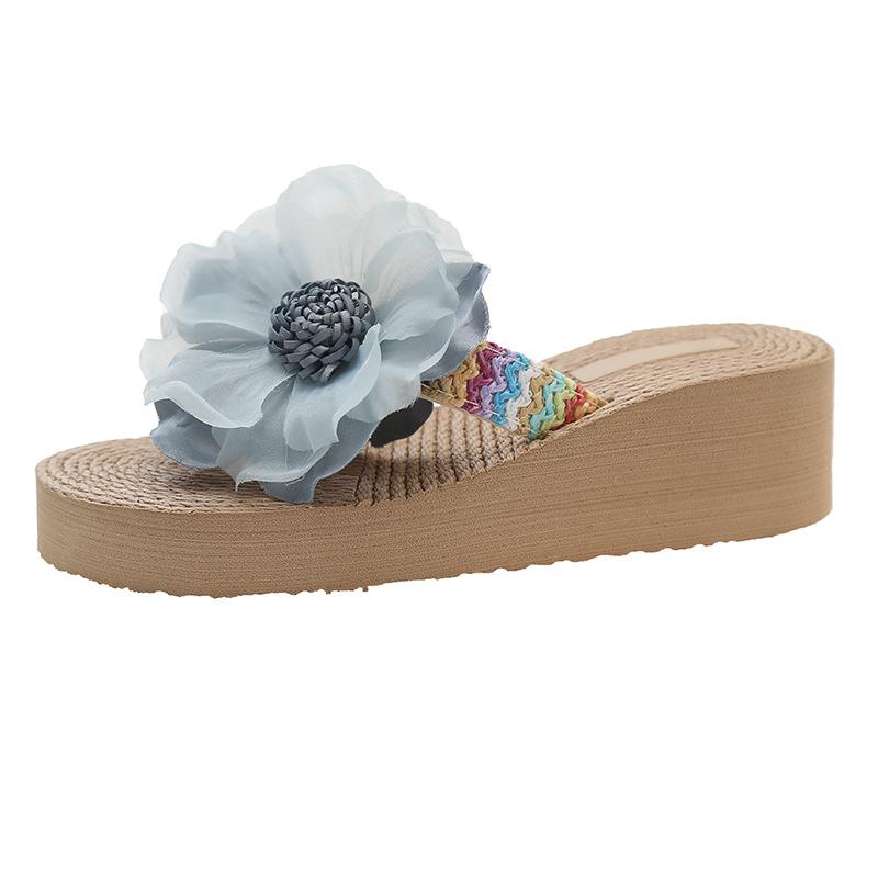 Nischen-neue Feenwind-Absatz-Zehensandalen Sommer-Mode Stroh gewebt Blume Plateau pastoraler Urlaub Strandschuhe