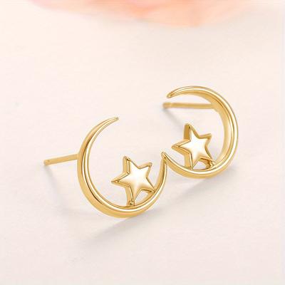 A Pair of Star and Moon Student Earrings, In A Simple Style. Star and Moon Earrings with The Same Luster Are Suitable for Daily Wear