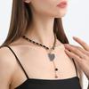 A Black Heart-shaped Mother-of-pearl Necklace Wrapped In Velvet, A Cold And Elegant Female Collarbone Chain With Tassels.