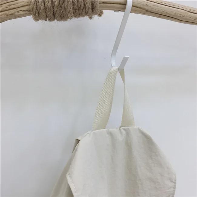 Introducing the New Simple Nylon Drawstring Backpack: a Spacious, Versatile Bag Perfect for Students, Leisure Trips, and Sports Activities.