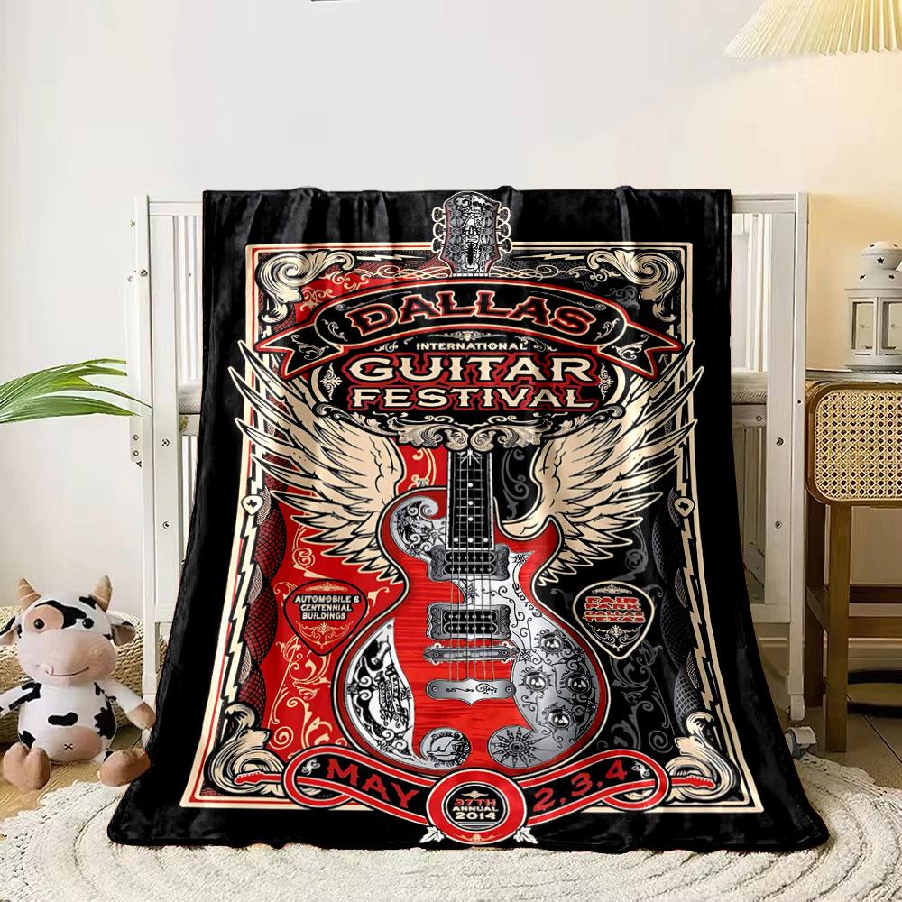 Stylized guitar with intricate designs, surrounded by wings and bold text. for all seasons blanket lunch break throw gift 80cm x 120cm