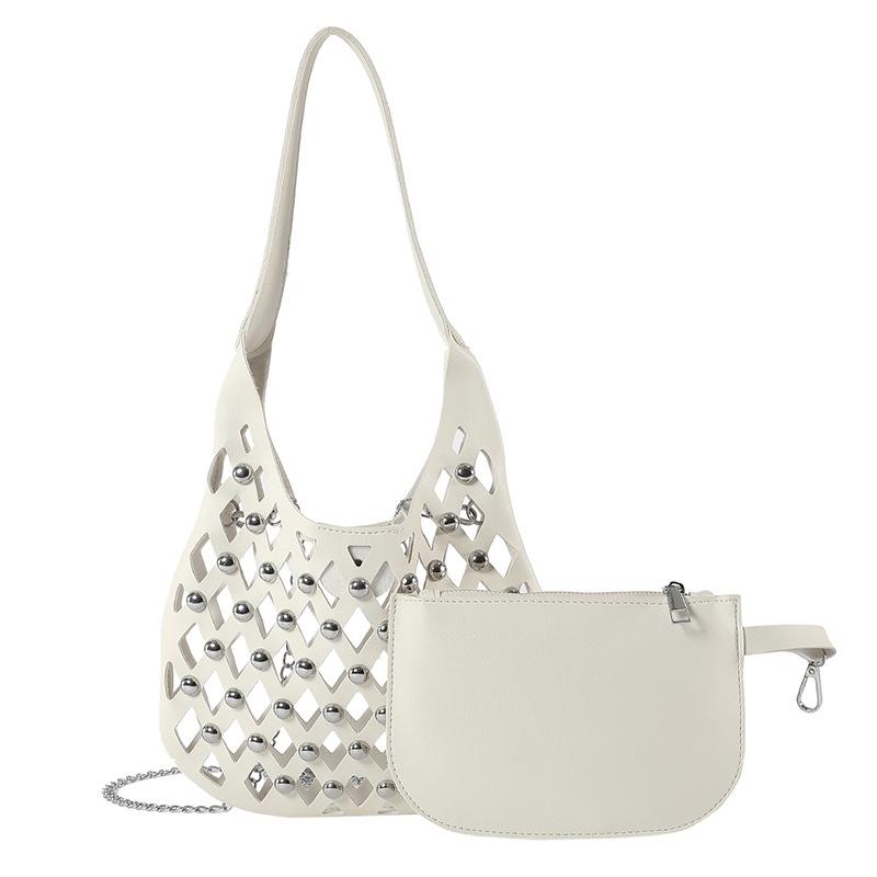 Hollow Underarm Bag for Women with Niche Design 2024 New Hollowed Out Sky Star Commuting Fashionable Rivet Single Shoulder Crossbody Bag