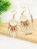 Trendy Minimalist Style Gold Color Scheme Feather Shaped Pendant Earrings Women's Temperament Fashion Gentleness And Versatility