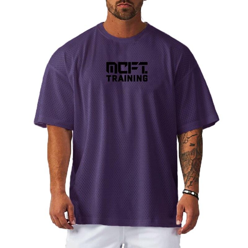 Muscleguys Auf Lager Jugendsport Herren-Fitnesskleidung Kurzarm-T-Shirts Dünne atmungsaktive Sommer-Fitness-Mesh-Tops