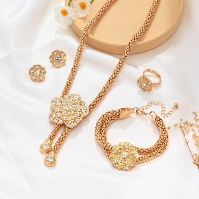 Elegant Floral Rhinestone Jewelry Set: Necklace, Bracelet, Earrings, Ring