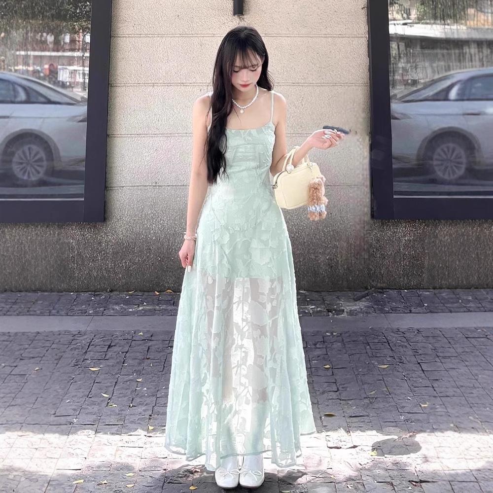 Seaside vacation wind green suspender dress women's summer temperament mesh stitching waist thin a-word skirt long dress