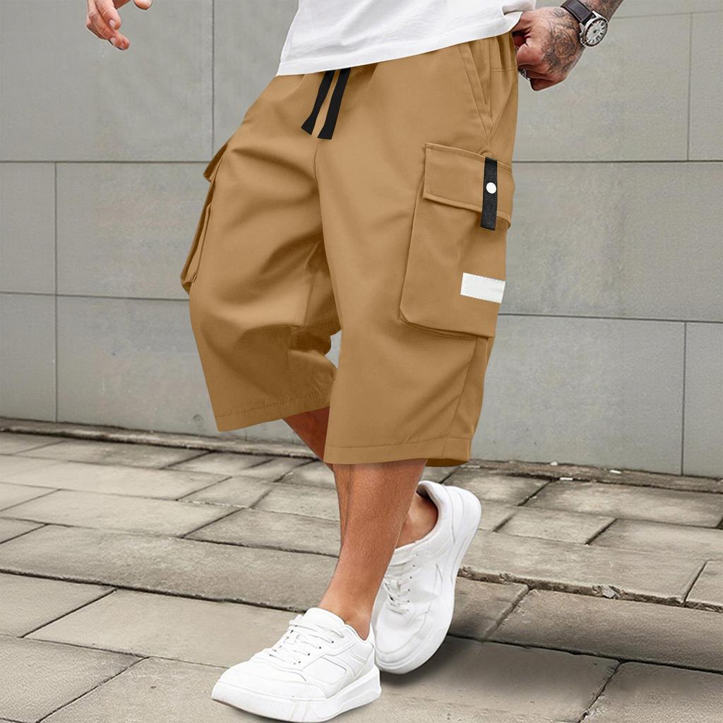 Men's casual and fashionable lace-up lightweight and breathable sports shorts. Men's loose and large-sized multi-pocket workwear shorts.