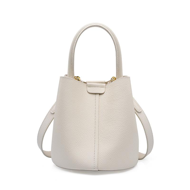 New first-layer cowhide bag, high-end niche design women's bag, spring and summer leather single shoulder crossbody bucket bag