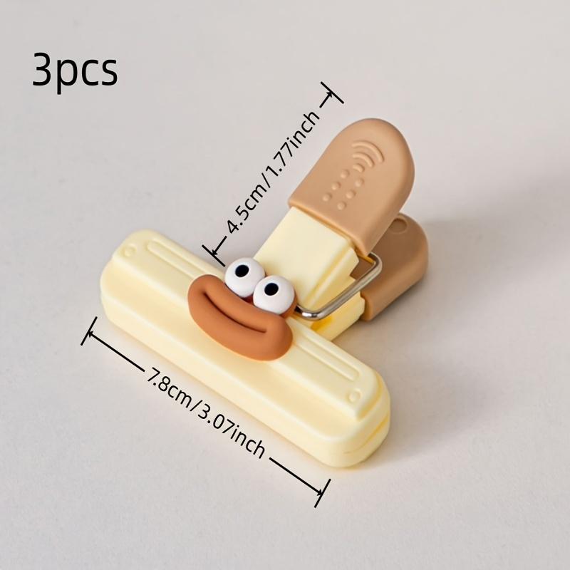 3pcs cartoon food sealing clips, moisture-proof plastic snack clips, multi-use for kitchen, office and school storage.