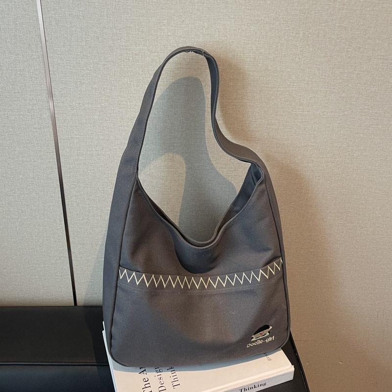 Простая женская холщовая сумка-тоут с вышивкой: 2026 Новый Маленький Нишевый Дизайн, Ручная Сумка и Сумка на Плечо, Большой Объем.