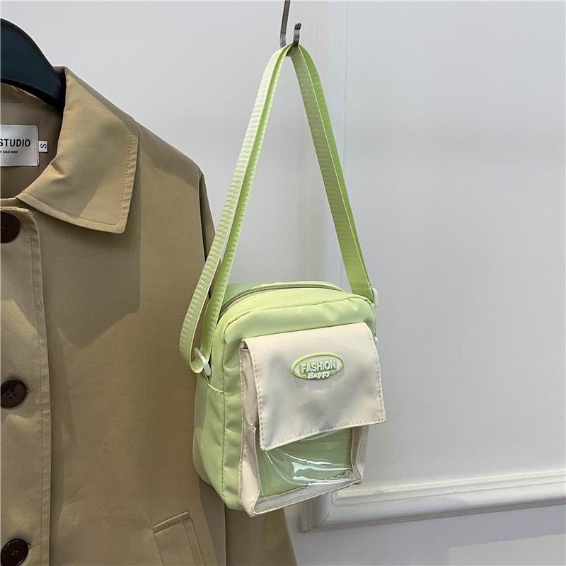 

Contrasting colors, fashionable Korean version, one-shoulder messenger bag 2025 new model, popular foreign style cycling casual mobile phone bag this зелёный