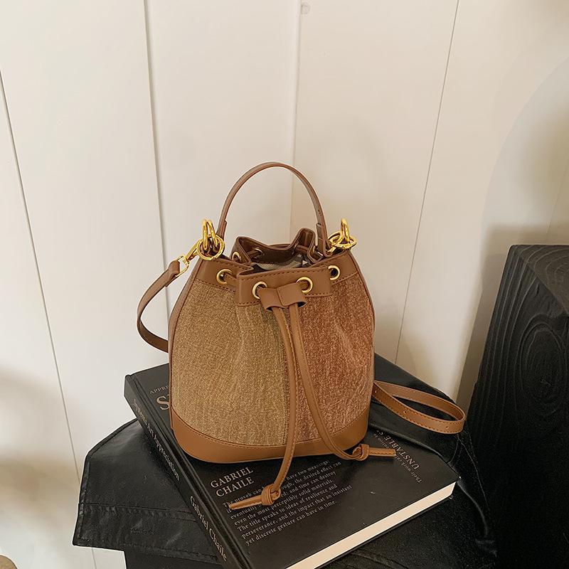 New bag women's 2025 popular bucket bag autumn and winter niche design messenger bag high-end sense work small bag