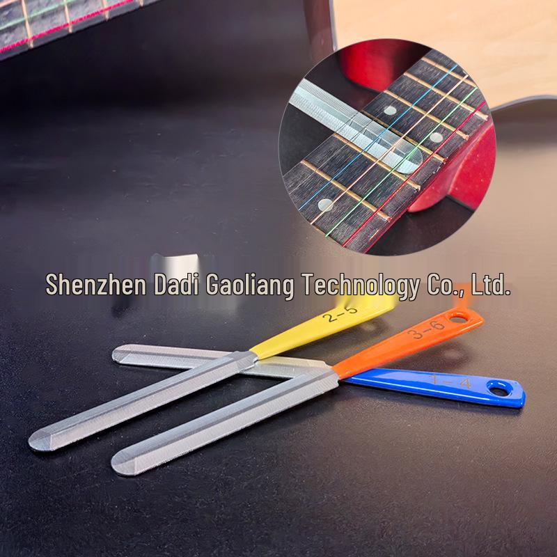 Verktygssats för filning av gitarrsadelspår och justering av strängavstånd