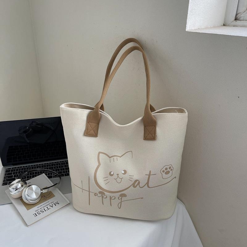 Large Capacity Tote Bag 2025 Autumn New Korean Version of Fashion Niche Cartoon Canvas Bag Casual Commuter Shoulder Bag