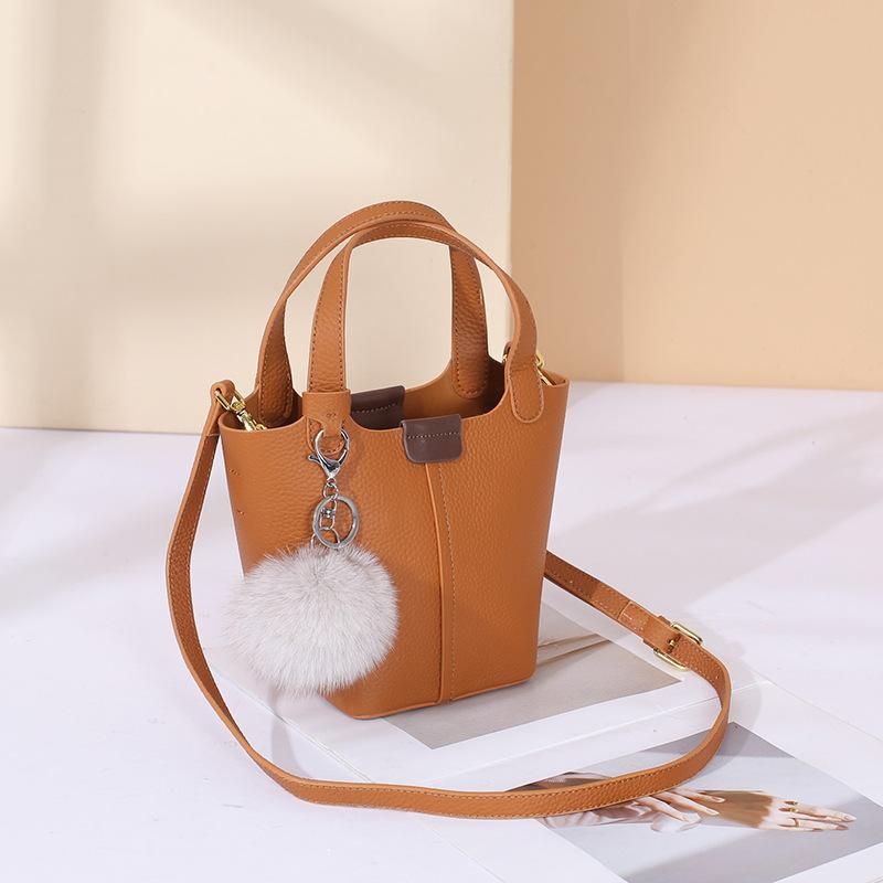New versatile first-layer cowhide women's handbag light luxury leather large-capacity vegetable basket women's bag storage