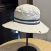 New Simple Two-tone Striped Fisherman Hat for Men and Women, Suitable for Outdoor Activities Like Mountaineering, Camping, and Hiking, Provides Sun