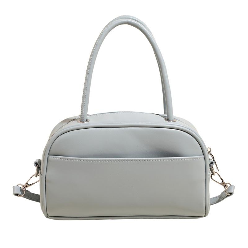 Spring and summer new Korean version niche solid color texture portable pillow bag fashionable commuter style versatile casual messenger women's bag