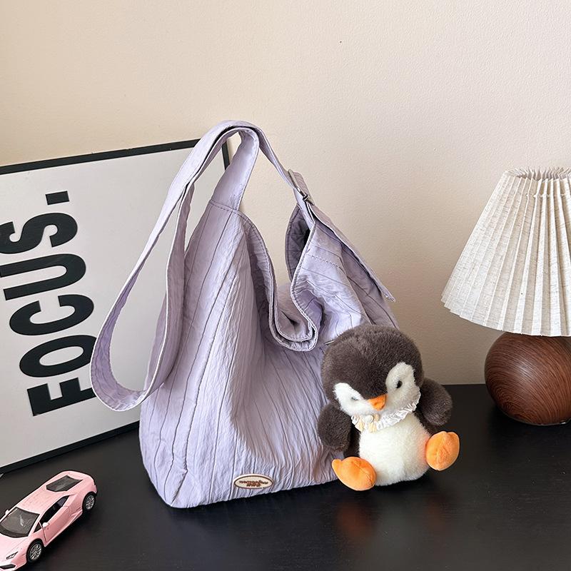 Casual large-capacity cartoon canvas bag women's 2025 new commuter versatile shoulder bag college student tote bag