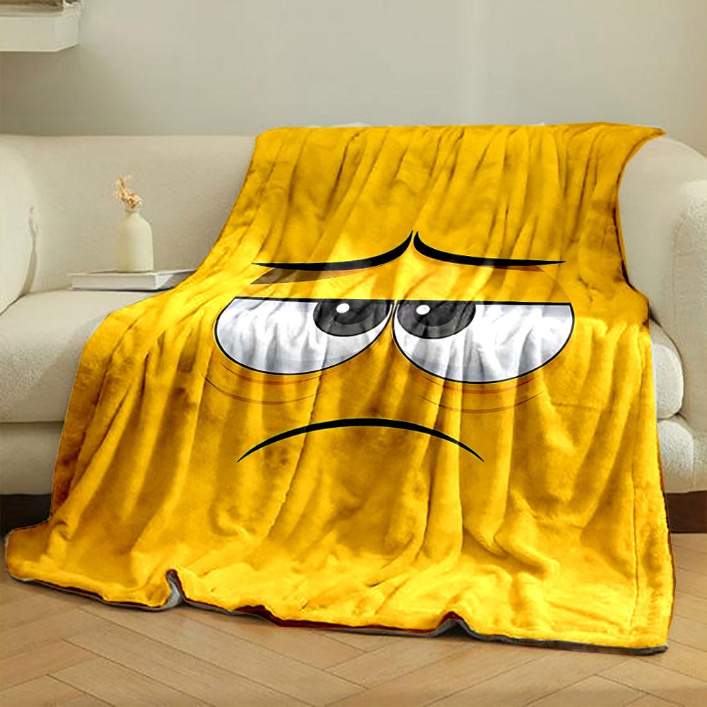 Yellow background with a sad cartoon face featuring droopy eyes and frown. for all seasons blanket lunch break throw gift