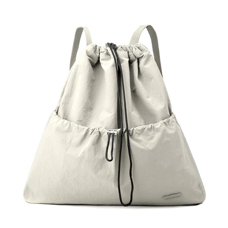Niche daily leisure lightweight sports drawstring backpack commuter student schoolbag