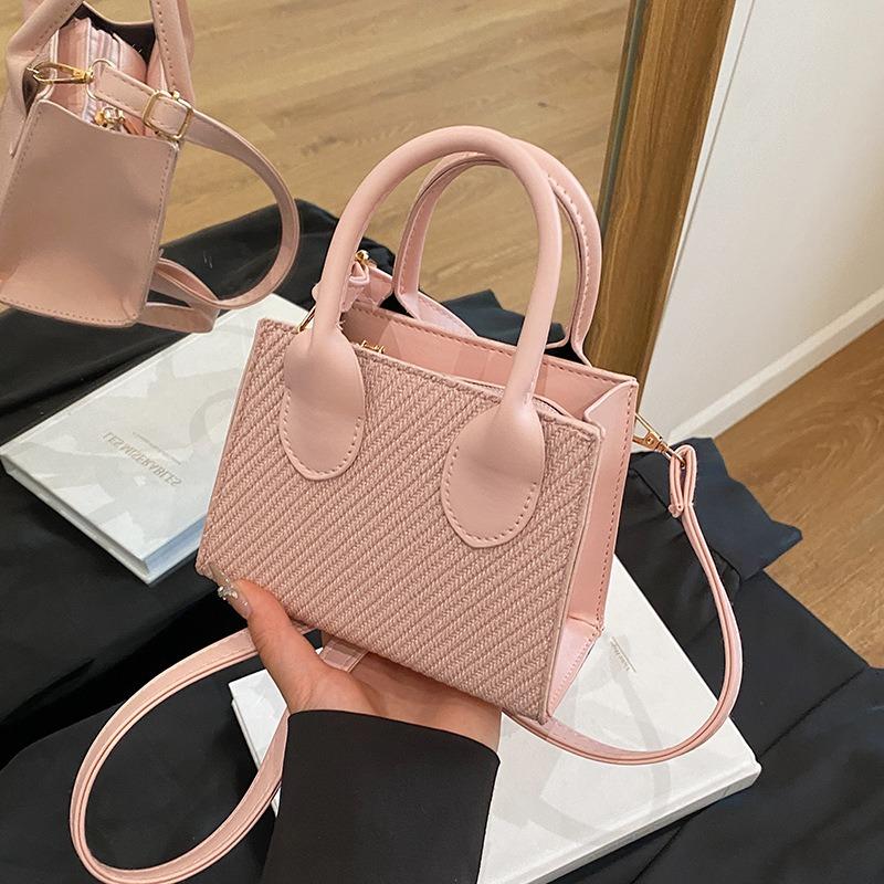 Sommer neue Tasche Damenmode einfache Umhängetasche tragbare kleine quadratische Tasche Damentasche lässige Pendler Umhängetasche