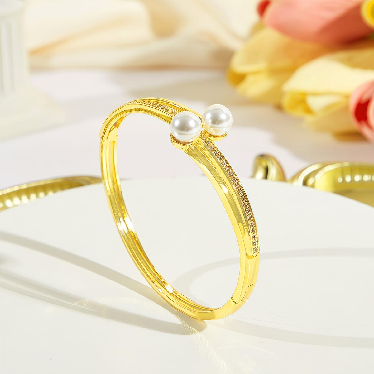 

CMM Разнообразие выбора ювелирных изделий Искусственный жемчуг Золотые браслеты из циркония Браслет с подвесками Банкетные вечеринки Свадебные украшения Аксессуары для женщин золотой