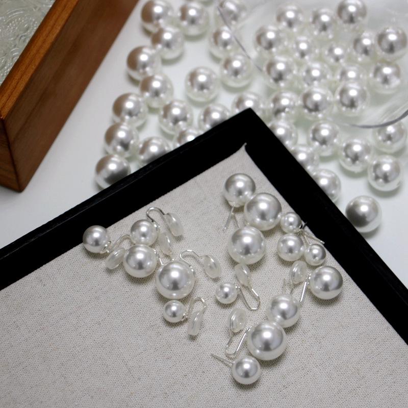 24 Retro Crystal Glass Pearl Stud Earrings with French 925 Silver Needles - Perfectly Round Ear Clips In Cool White Light