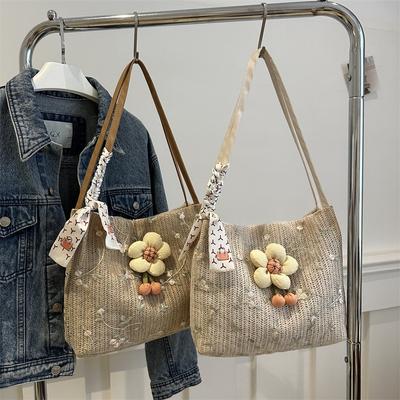 Niche Knitted Bucket Bag New Style Class Commuter Tote Bag for Women Large Capacity Vacation One Shoulder Straw Woven Bag