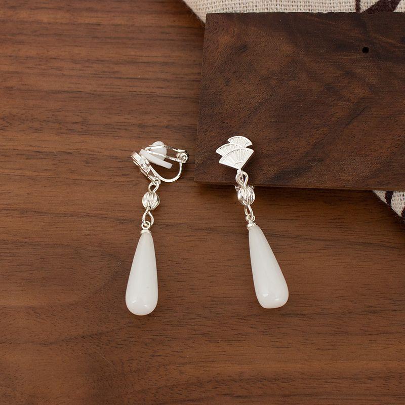 

Артси Холодное Ощущение Белый Москитный Репеллент Клипса для Ушей Халцедон Padded clip without ear holes. A pair