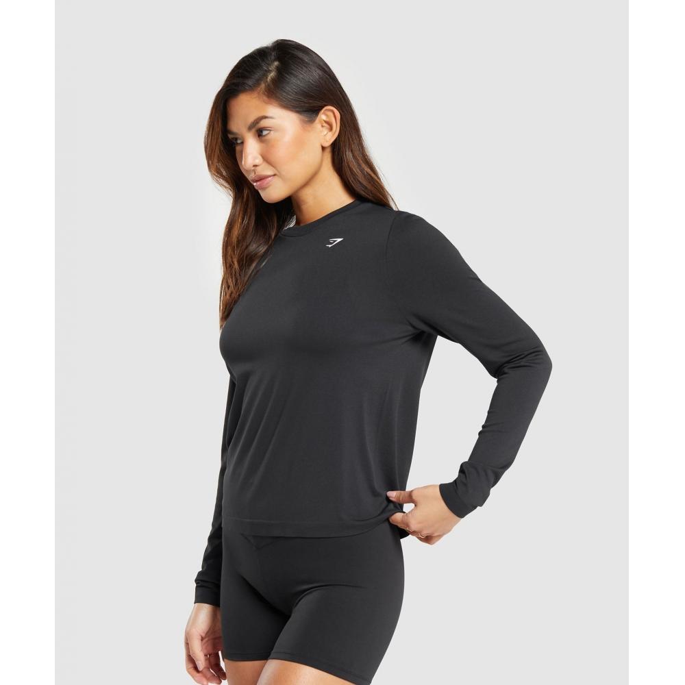 Gymshark Camiseta de manga larga sin costuras para uso diario, color negro, talla B8a4q y talla Bb2j