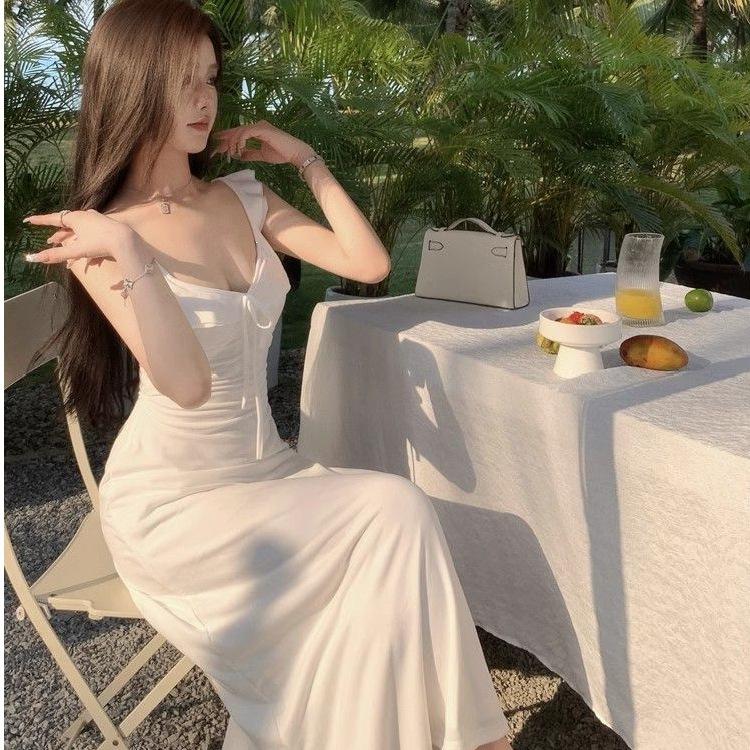 Gentle wind white suspender halter dress children's summer 2026 new seaside film fairy beautiful long dress