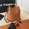 High-end Style Bucket-shaped Lady's Bag with Luxurious Texture for Carrying On The Arm or Slung Over The Shoulder.
