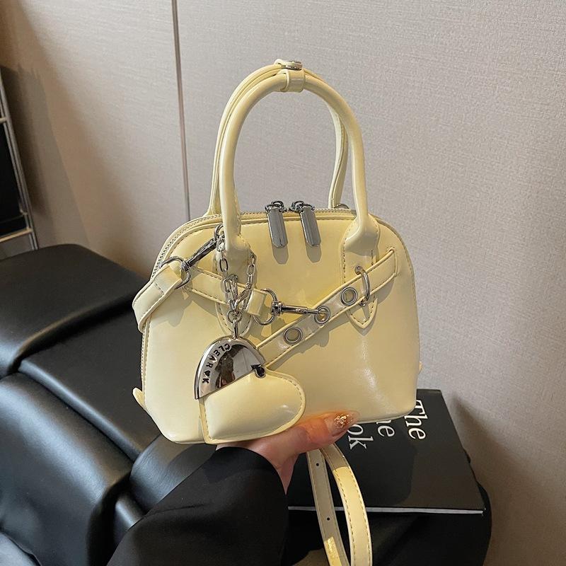 2025 Spring and Summer New Locomotive Style Portable Shell Bag Women's Fashion Versatile Commuter Messenger Bag Bag