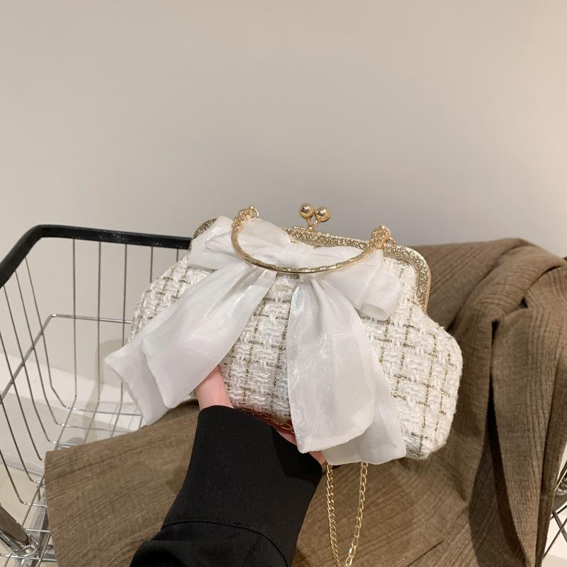 High-value French fashion bag 2025 new retro bow underarm messenger bag wedding foreign handbag