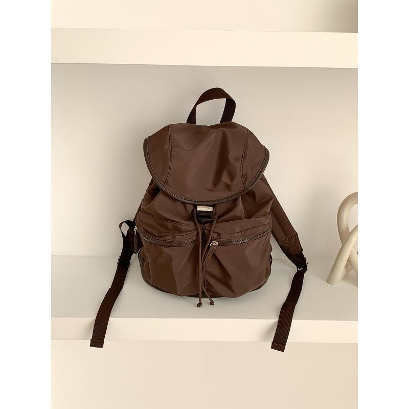 

New pull rope pleated flip student backpack backpack girls nylon niche large capacity backpack women кавовий