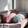 A seashell-shaped pillow, suitable for living room sofas, bedrooms, offices, and home decor.