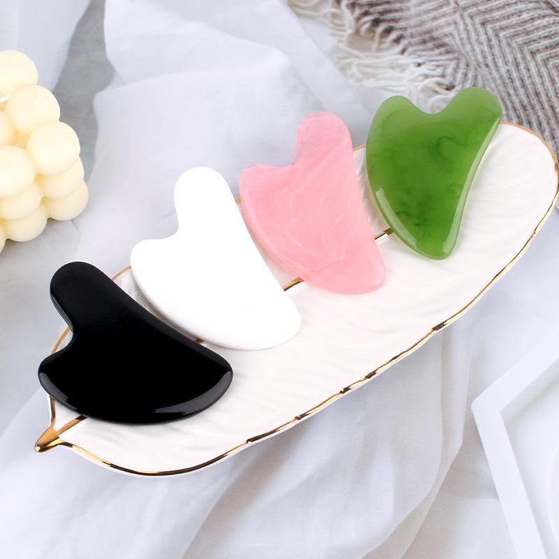 

Heart-Shaped Rose Quartz Facial Scraping Tool and Meridian Stick Black Heart-Shaped