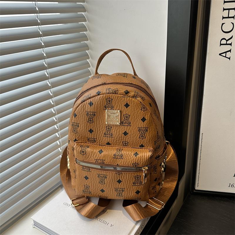 Mode trend avslappnad textur ryggsäck vår nya nisch design damväska enkel ryggsäck