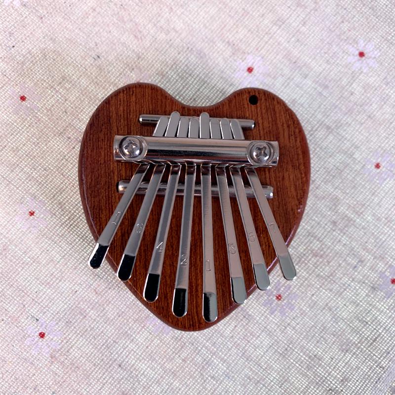 

Мини-калимба на 8 нот: Калимба из массива дерева и прозрачного кристалла